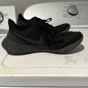 Women’s black Nike shoes